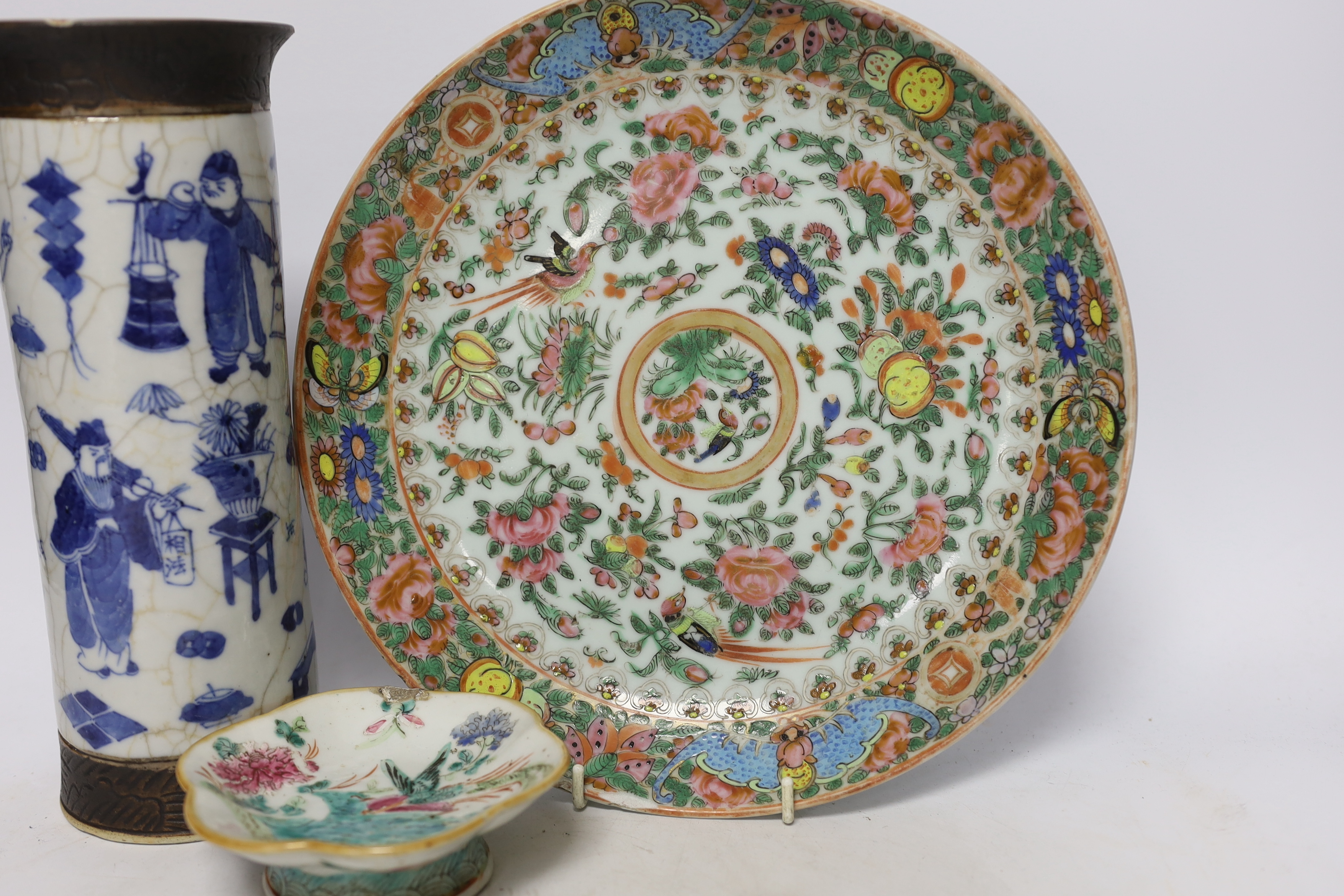 Five Chinese porcelain items including a blue and white crackle glaze cylindrical vase and a celadon glaze tea bowl and stand, largest 29cm in diameter